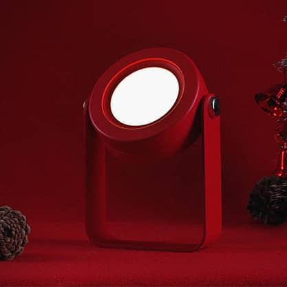 Giggly Gear compact desk lamp with adjustable brightness in red for versatile lighting