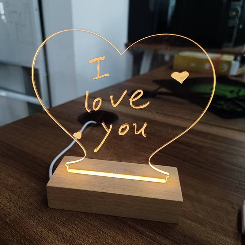 Giggly Gear heart shaped LED message board gift with wooden base displaying I love you message