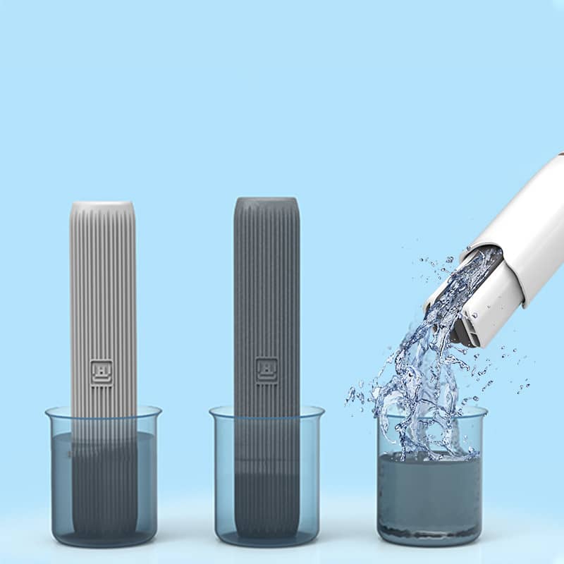 Giggly Gear compact desk cleaning tool in grey and dark grey with water cleaning demonstration