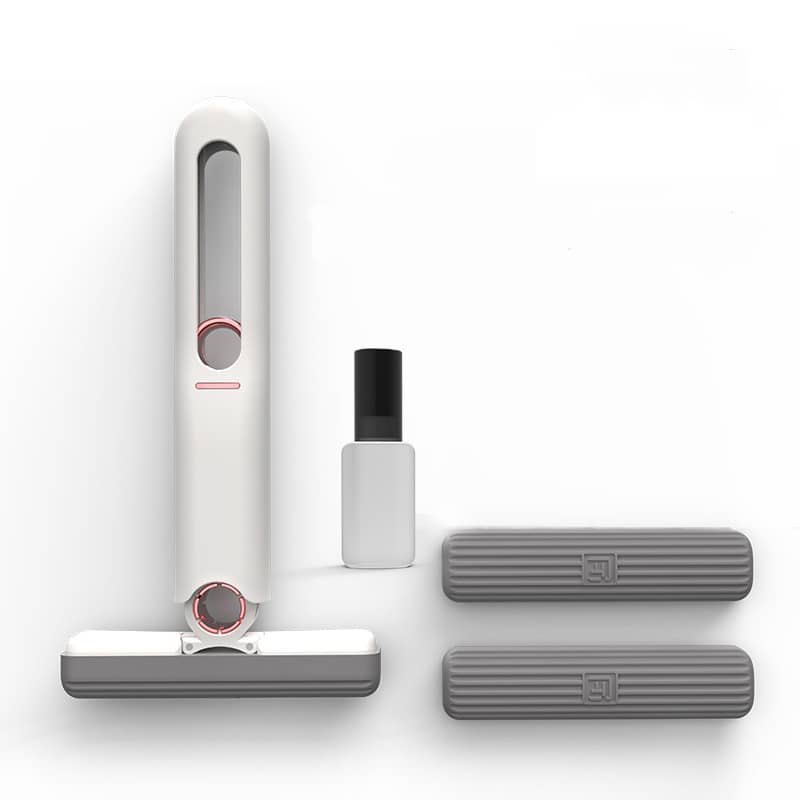 Giggly Gear compact desk cleaning tool in white and grey with two replacement pads and cleaning spray